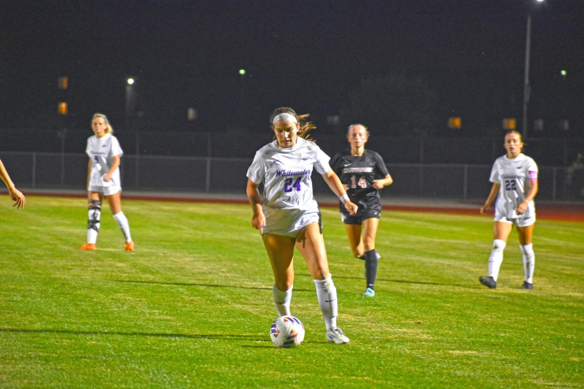 UW-Whitewater women’s soccer freshman forward Rowan Severson dribbles the ball down the field to advance the ball against Carthage College on September 10th, 2025 at Fiskum Field.