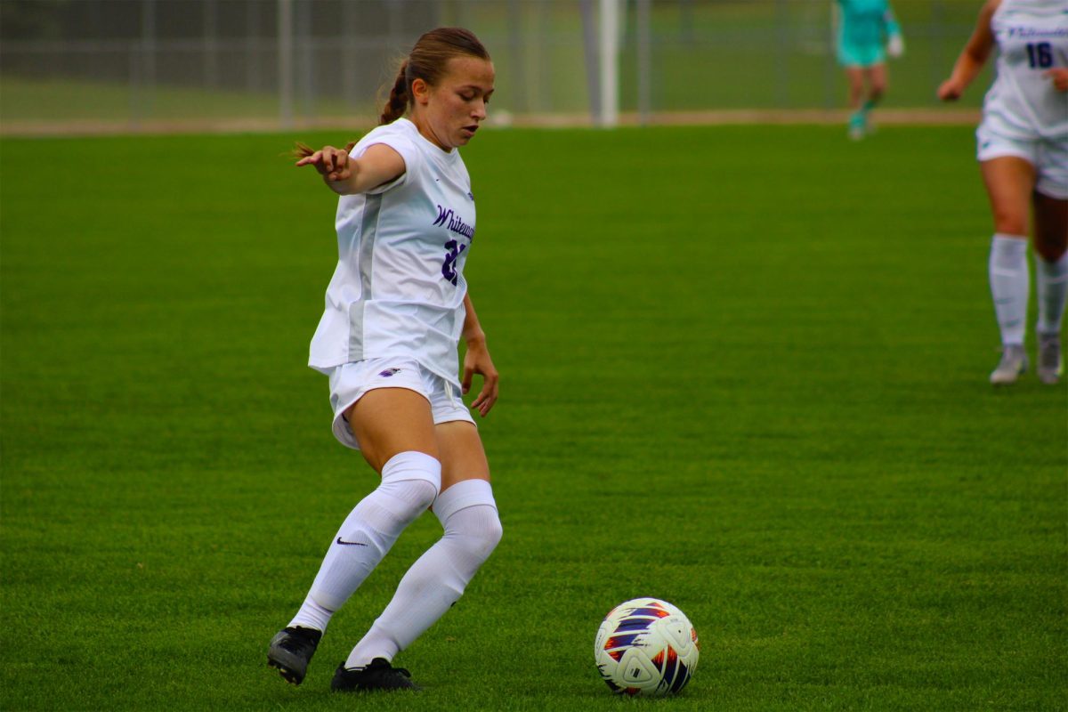 Sophomore forward/midfielder Jasmine Wilson attempts to juke a defender against Cornell College Saturday, Sept. 20 at Fiskum Field in Whitewater.
