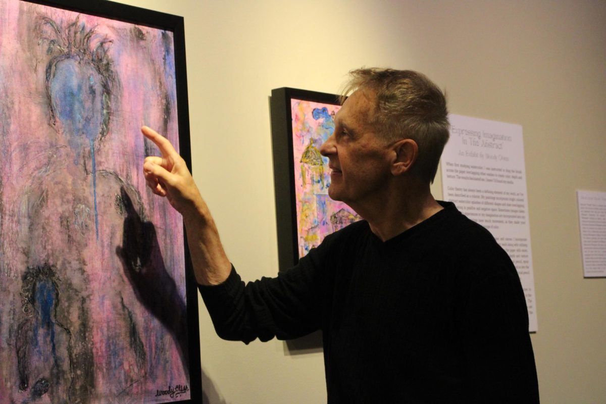 Woody details his Mixed Media piece, “Mysterious Encounter” 2025, Tuesday, Oct. 7