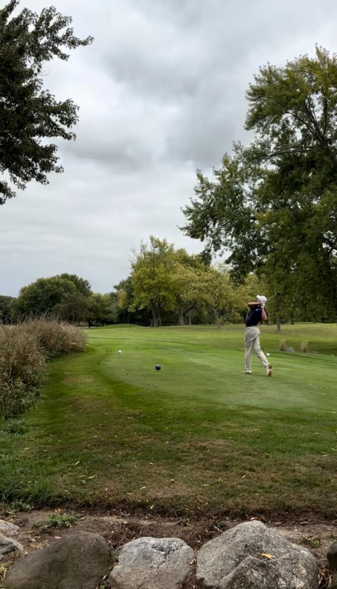 Club golf player finishes through his swing in the oct 11th tournament at Muskego


