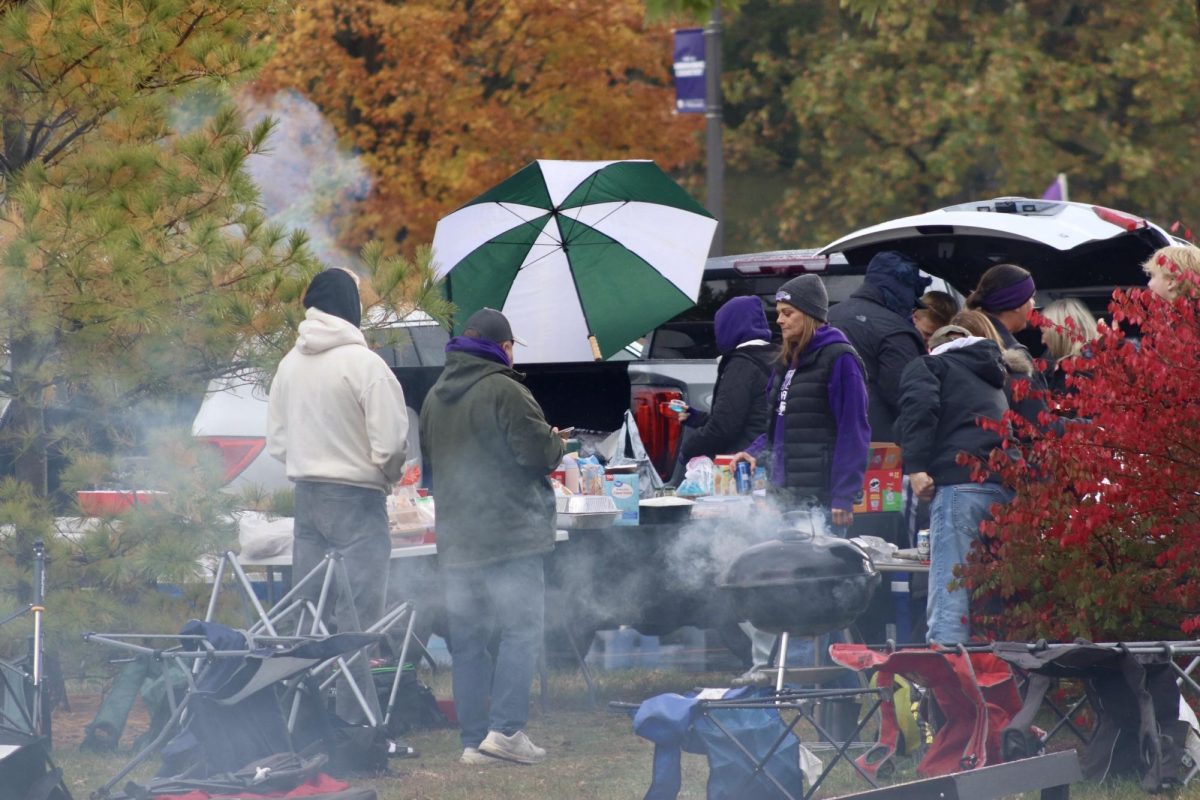 Fans of UW-Whitewater tailgate before the big Homecoming Football game in the Perkins Field parking lot on Oct. 25th, 2025.