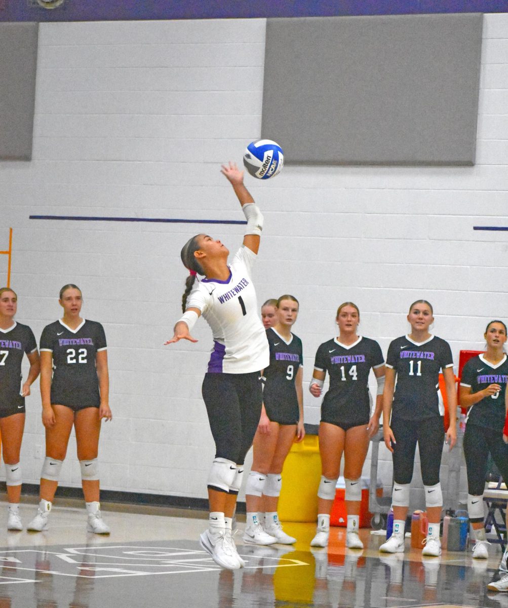 The UW-Whitewater freshman defensive specialist Ella Jenkins serves the ball against Illinois College on Sept. 27th 2025 at the Kris Russell Volleyball Arena.