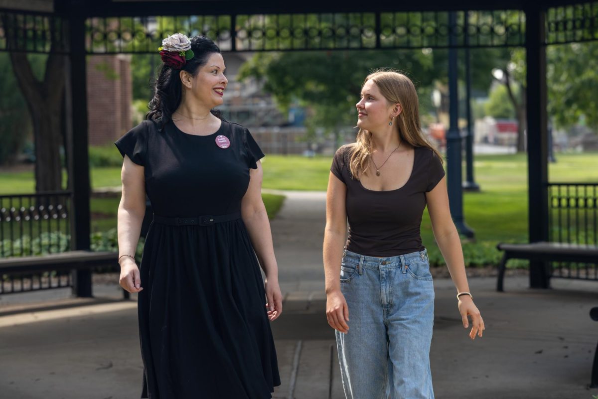 From left, Angela Geraci, UWL assistant professor of Public Health & Community Health Education, walks with UWL Senior Maddie Jo Baumann. (UW-La Crosse)