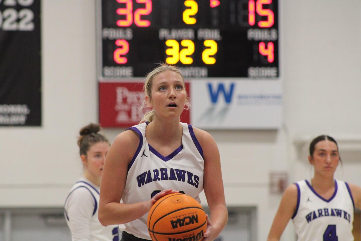 Junior guard Camryn Nies shoots a free throw against Principia University, Tuesday, Nov. 25, at the Kachel Gymnasium.