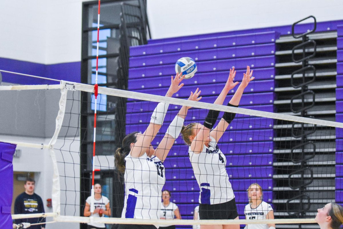 The UW-Whitewater Warhawks junior Emily Wortman and sophomore Makenna Poullie go for a block against UW-Platteville, Feb. 20, 2026 in the Kris Russell Volleyball Arena. 