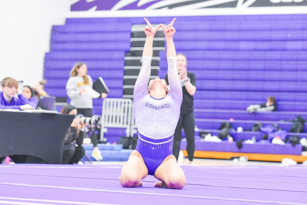 The UW-Whitewater Warhawk junior all-around Paige Magel glows as she finishes her floor routine against Gustavus Adolphus College in the Kachel Gymnasium, Jan. 30, 2026.