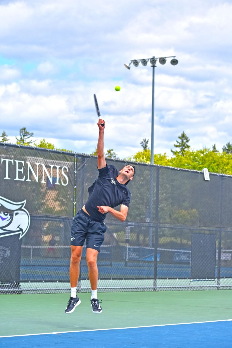 UW-Whitewater men’s tennis junior Theo Billson jumps to serve the ball against his opponent at the
Warhawk Men’s Fall Invite on September 5th, 2025 at the Wangerin Tennis Courts.