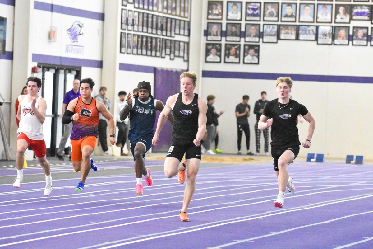 The UW-Whitewater Warhawk junior sprinter Caleb Beightol sprints down the track on Jan. 25, 2026 at the Karl Schlender Invitational in the Kachel Fieldhouse. 
