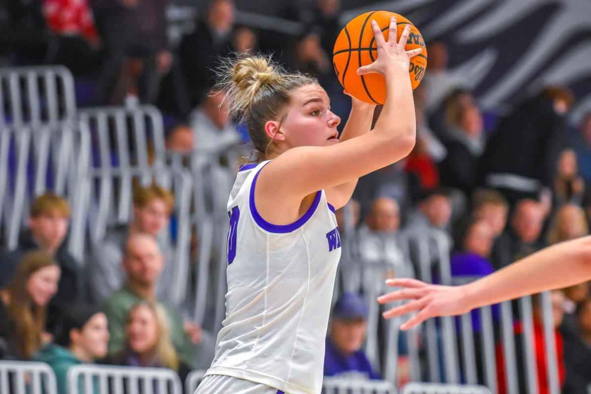 The UW-Whitewater Warhawks freshman forward Brooke Stenklyft looks for an open pass against UW-Oskhosh, Jan. 28, 2026 in the Kachel Gymnasium. 
