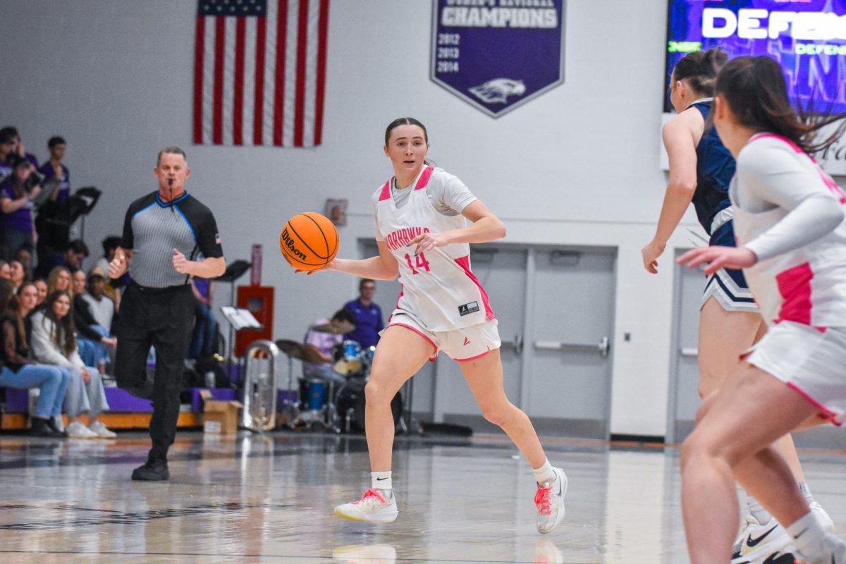 The UW-Whitewater Warhawk junior guard Bri McCurdy dribbles down the court against UW-Stout on Feb. 7, 2026 in the Kachel Gymnasium.
