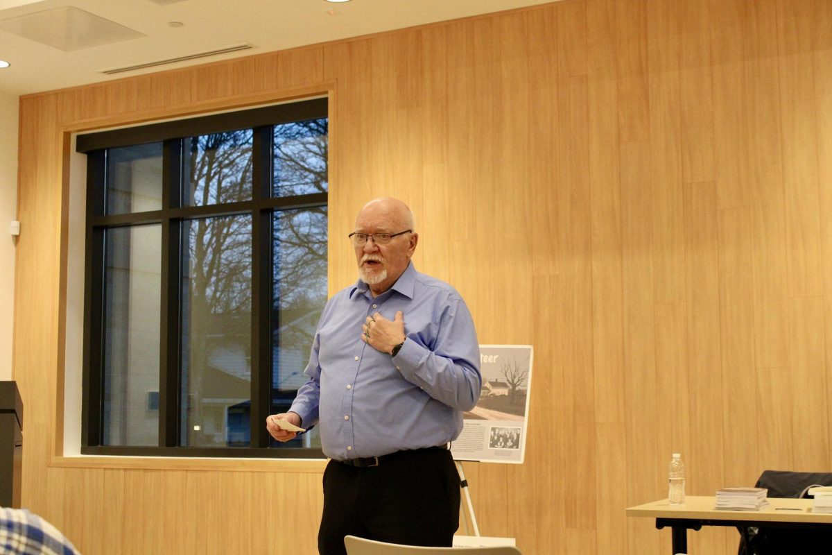 Author Bill Mueller speaks at the Whitewater Public Library on March 10 about preserving family history and documenting personal stories for future generations. 