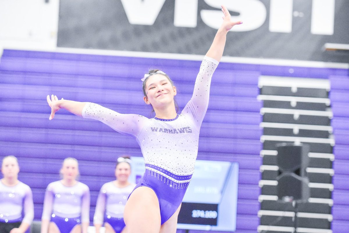 The UW-Whitewater Gymnastics junior Warhawk all-around Paige Magel performs her floor routine in a meet against Gustavus Adolphus College in the Kachel Gymnasium, Jan. 31, 2026. 