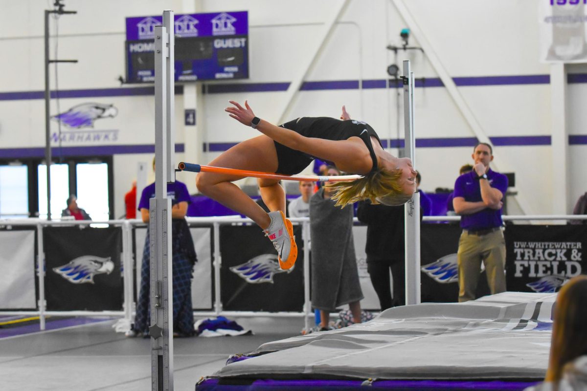  The UW-Whitewater Warhawk senior Danielle Pouska jumps over the bar in the high jump event at the Karl Schlender Invite in the Kachel Gymnasium, Jan. 24, 2026.
