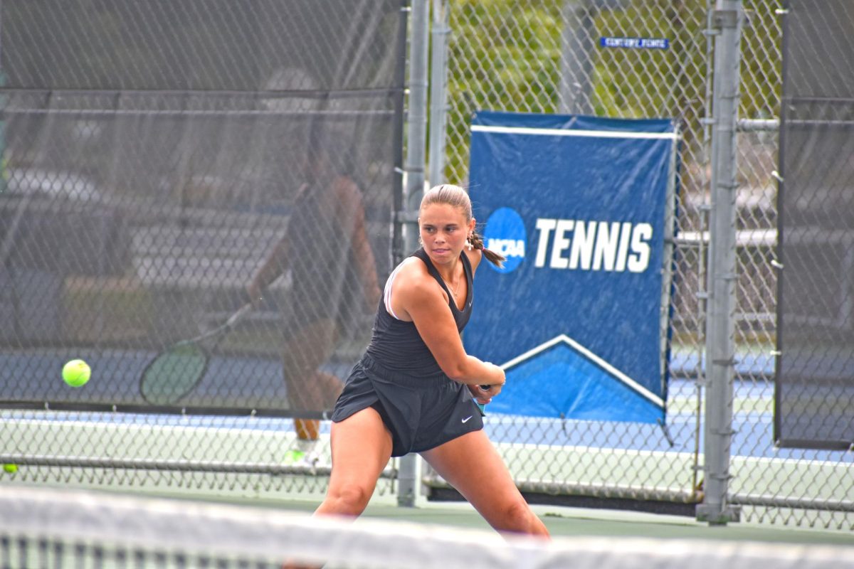 The UW-Whitewater Women’s Tennis Sophomore Warhawk, Abigail Weaver focuses on the ball to hit it against her singles opponent at the UW-Whitewater Women’s Tennis Warhawk Fall Invitational on August 30th, 2025 at the Warhawk Outdoor Tennis Complex.