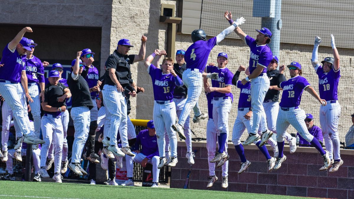 The UW-Whitewater baseball team celebrates after junior catcher Aaron Holland hits a solo home run against UW-River Falls, April 26, 2026 at Prucha Field. 
