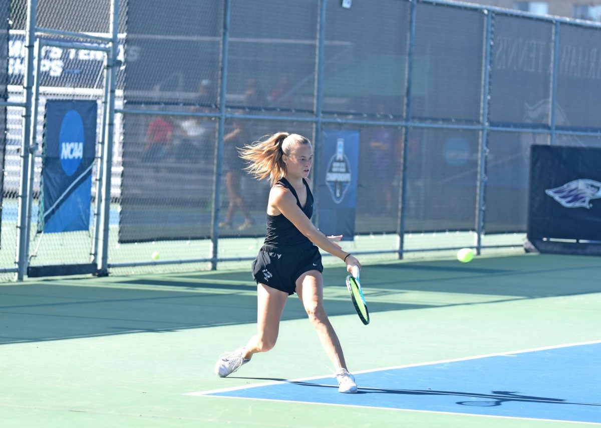 The UW-Whitewater Warhawk women’s tennis senior Molly Asfeld hits her ball back to her opponent during the WIAC Conference Match at the Warhawk Outdoor Tennis Complex, Oct. 18, 2026.