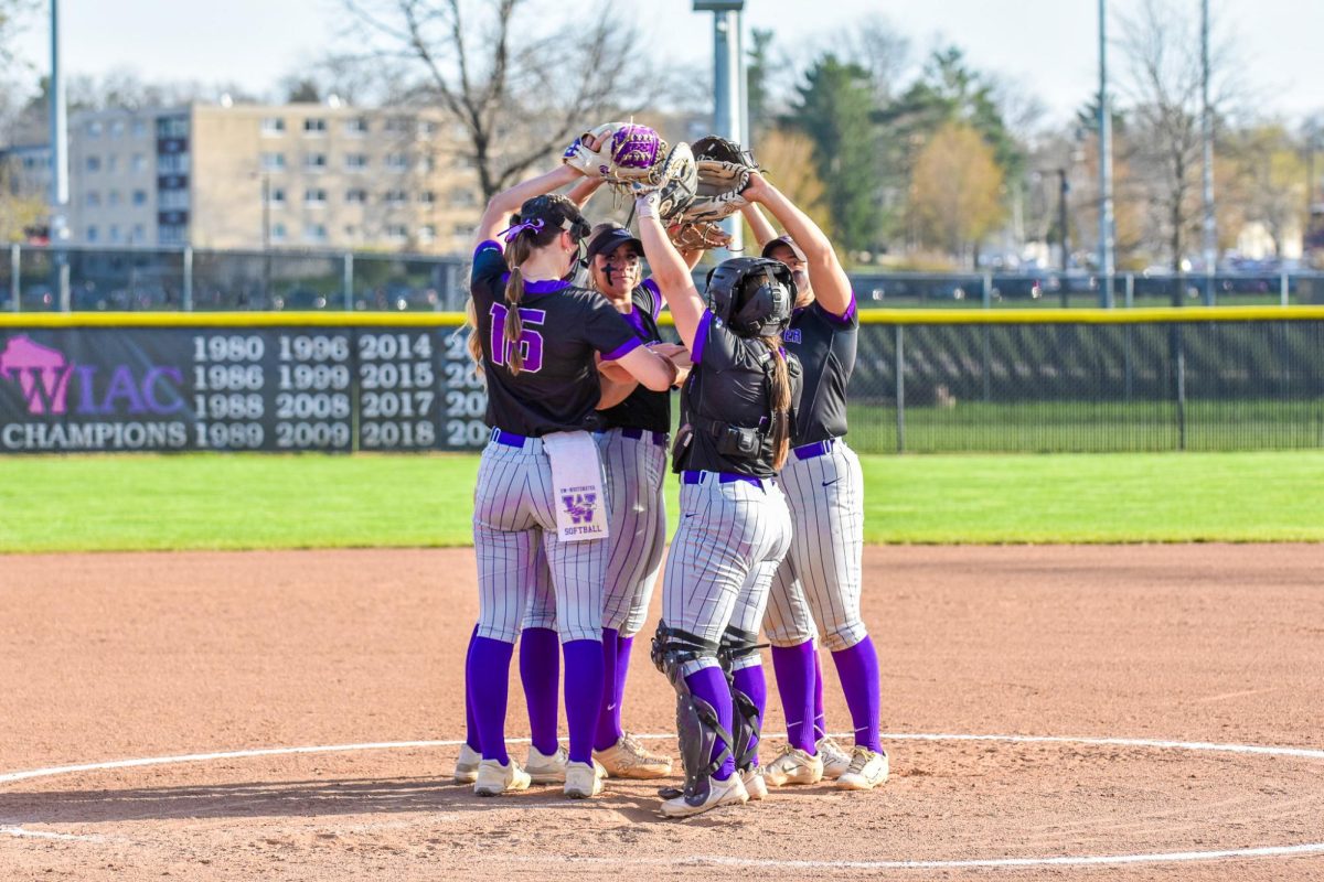 The UW-Whitewater softball team comes together before the start of their doubleheader against UW-Oshkosh, April 21. 2026 at the van Steenderen Complex. 